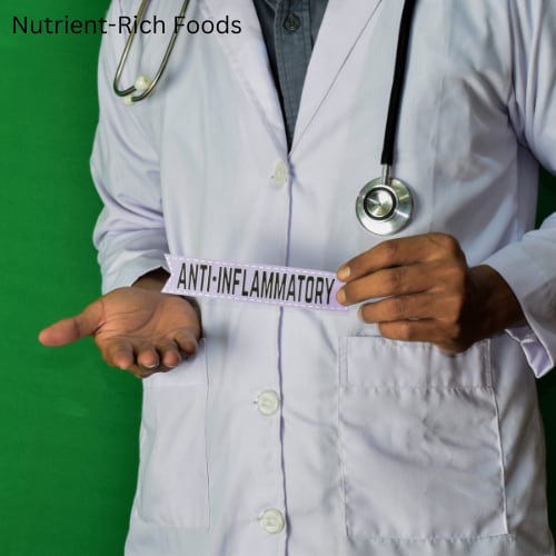 healthcare provider in lab coat holding a sign that says anti-inflammatory