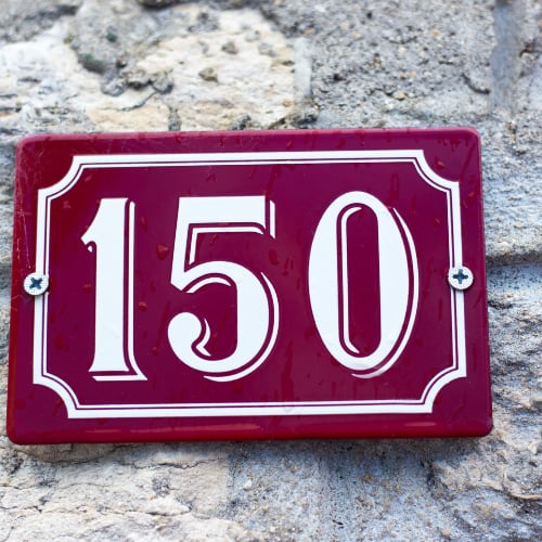 a street sign with the number 150 depicting the 250 year rule for healthier food choices