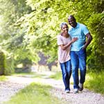 Aged African Couple Walking Together