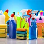 Assorted Spray Cleaning Supplies On Table
