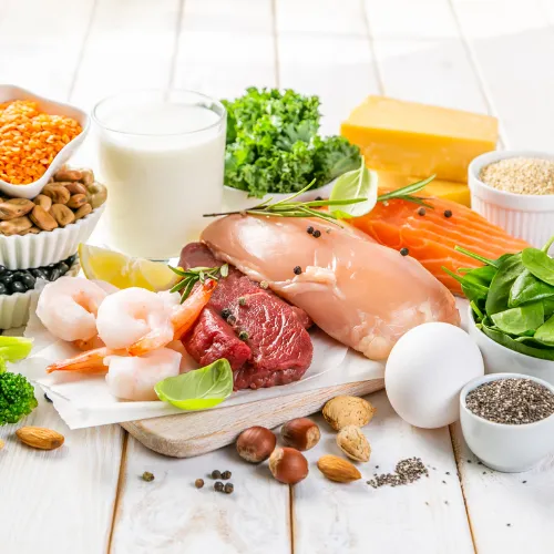 Animal and plant protein foods arranged side by side to compare complete and incomplete protein sources.