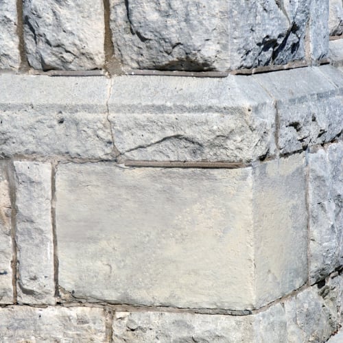 a cornerstone of a wall made from concrete depicting sleep as a cornerstone of wellness