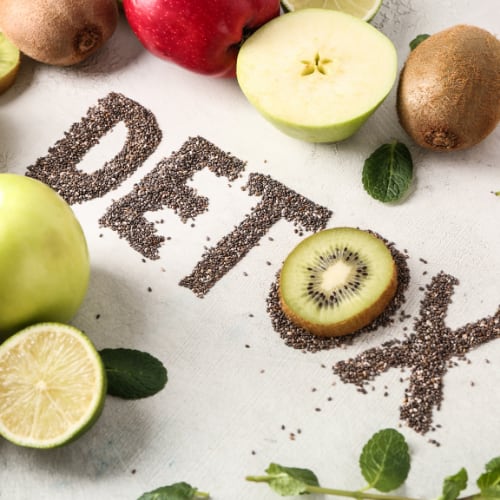 healthy foods arrayed to spell out the word detox