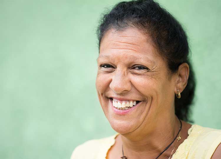 Elderly Hispanic woman smiling