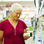 Elderly Woman Checking Food Label