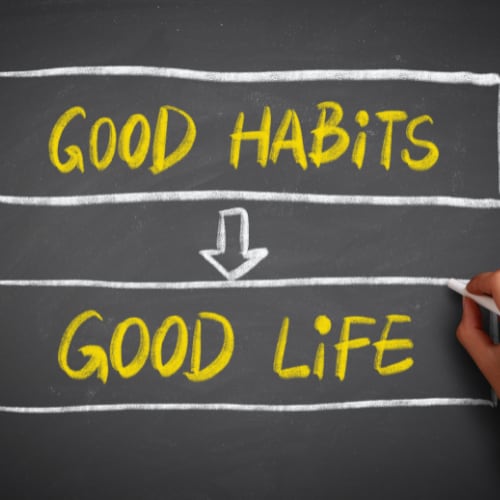 the words good habits - good life spelled out on a chalkboard