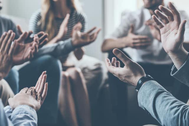 group of diverse adults interacting in a fun activity