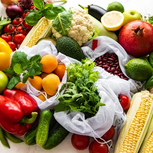 A variety of whole foods including vegetables, grains, and fruits representing diversity in everyday eating patterns.