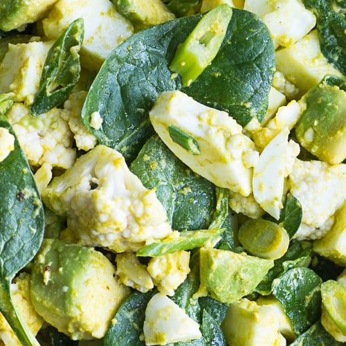 hard boiled eggs, avocado and seasonings for a keto salad