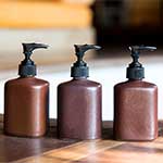 Brown Pump Lotion Bottles on Table