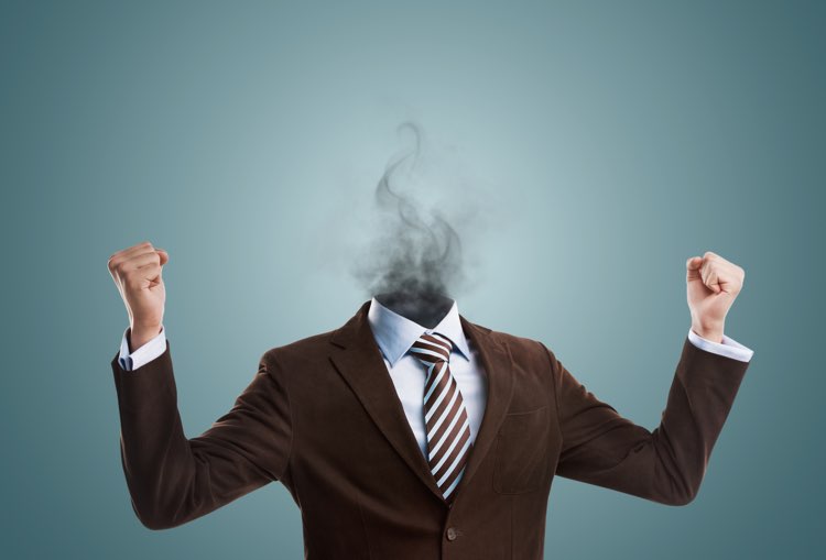 Man In Suit With Head Exploding Into Smoke