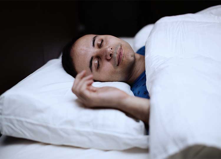 Man Sleeping Peacefully in Bed
