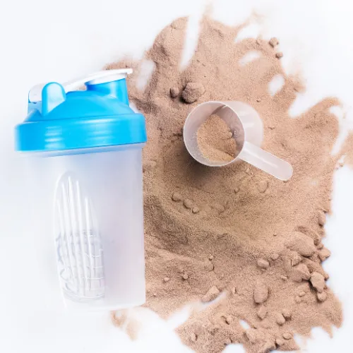 A protein shake and a meal-replacement shake displayed side by side with different supporting ingredients.