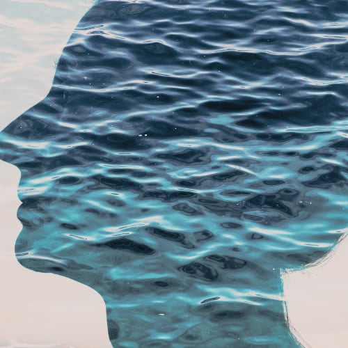 mindfulness and mental health concept double exposure of woman head and calm sea waves