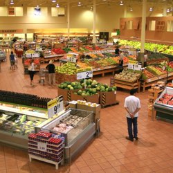 modern grocery store with gluten free and dairy free foods on the outer isles