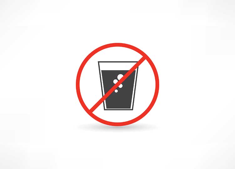 Glass of soda with prohibition symbol
