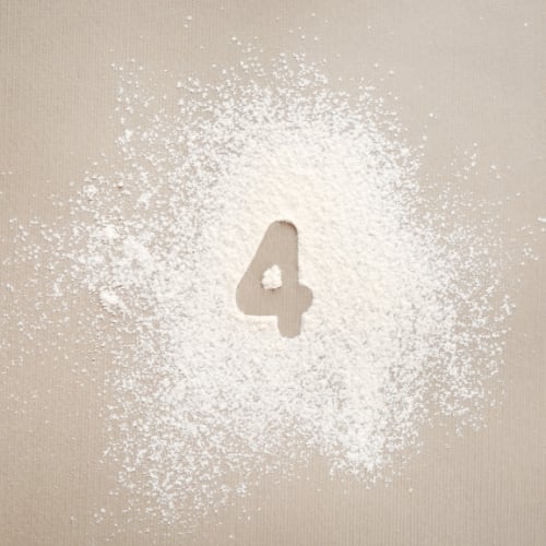 the number 4 illustrated on a tan background