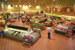 outer isles of a modern grocery store depicting fresh, whole, natural foods