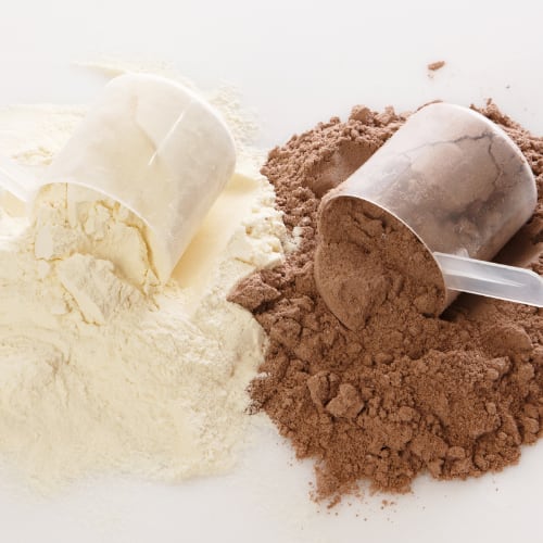 vanilla and chocolate protein powder mix with scoops