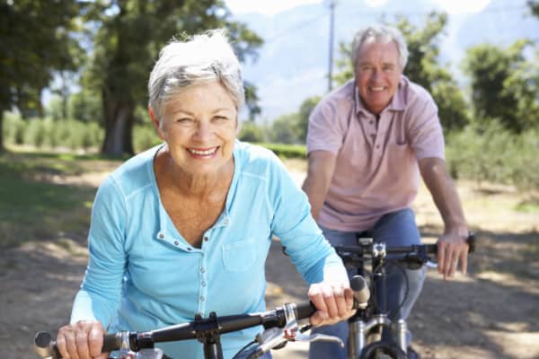 senior couple on a country bike ride