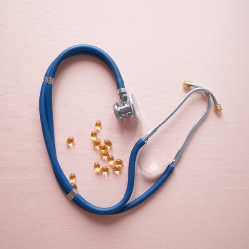 Stethoscope with vitamins as part of a preventative health care checkup
