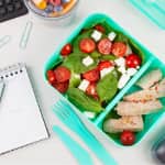 take away lunch box with fresh salad, chicken also depicting meal planner