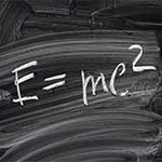 Theory of Relativity written on green chalkboard