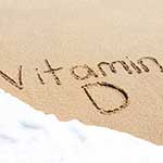 Vitamin D Written in Sand on Beach