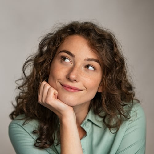 headshot of woman depicting a positive mindset