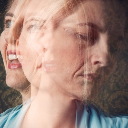 a woman's face depciting several different moods illustrating how different gfoods can affect your mood