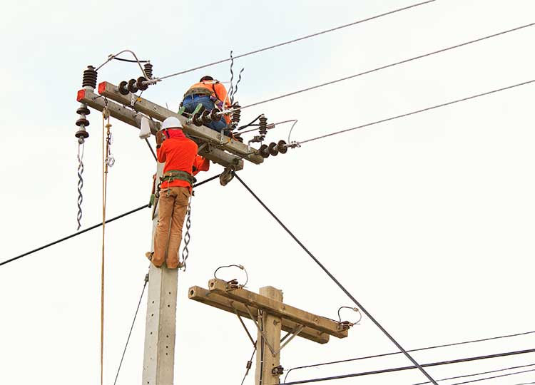 Workers Repairing Power Lines